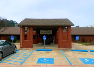 WHISPERING PINES LODGE