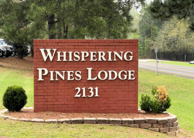 WHISPERING PINES LODGE photo 1