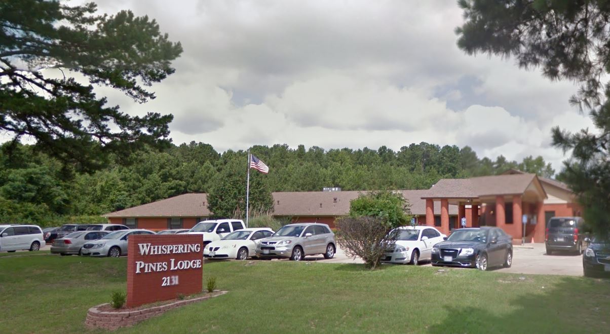 WHISPERING PINES LODGE photo 3